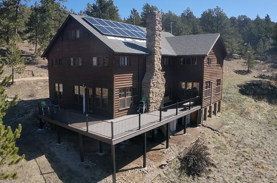Custom deck around a mountain home in Colorado, ready for spring outdoor living