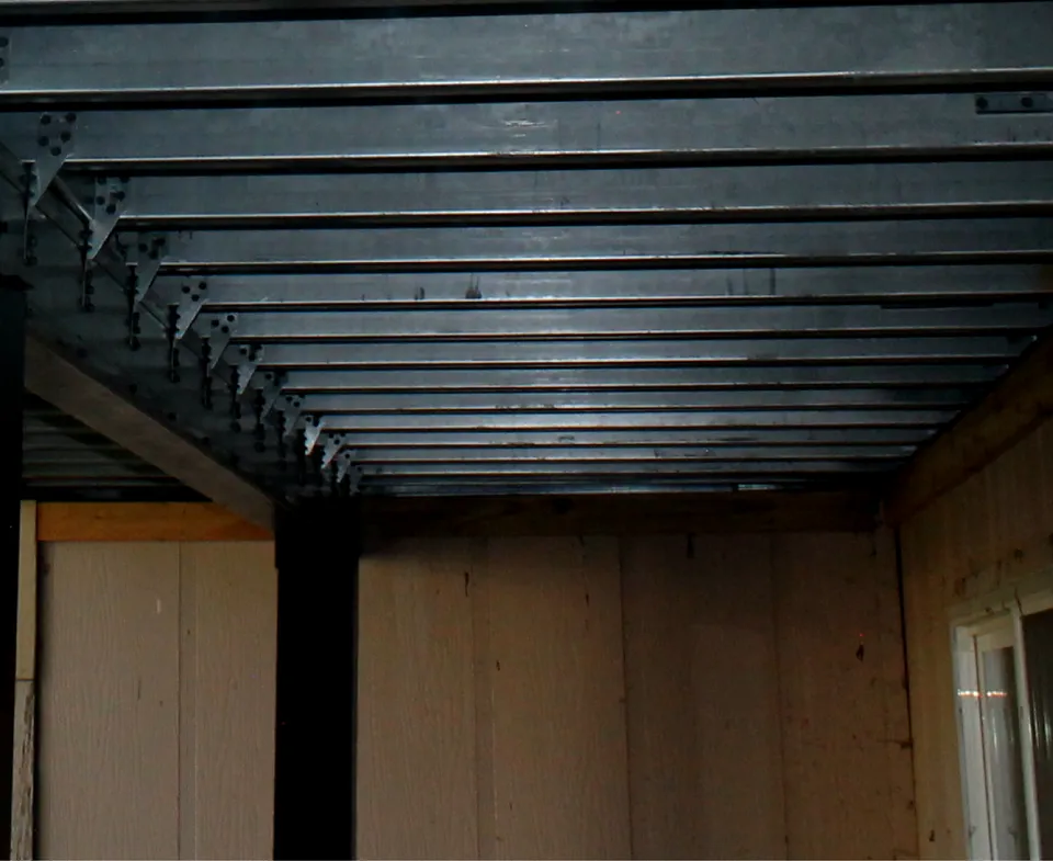 Steel deck framing installed as structural base for a custom deck in Colorado by Decks by Caio