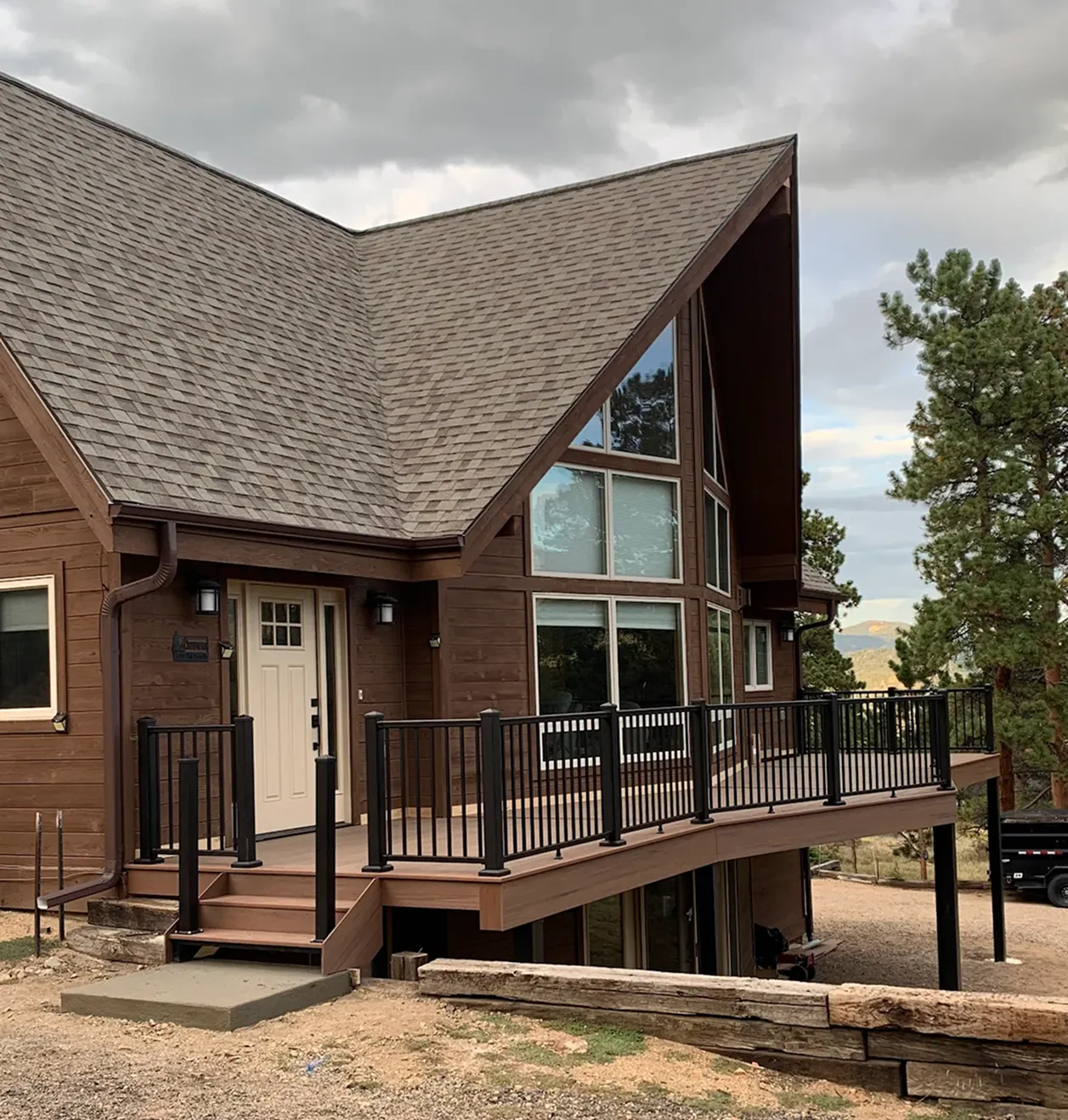 Custom deck built with composite decking and steel framing in Colorado by Decks by Caio