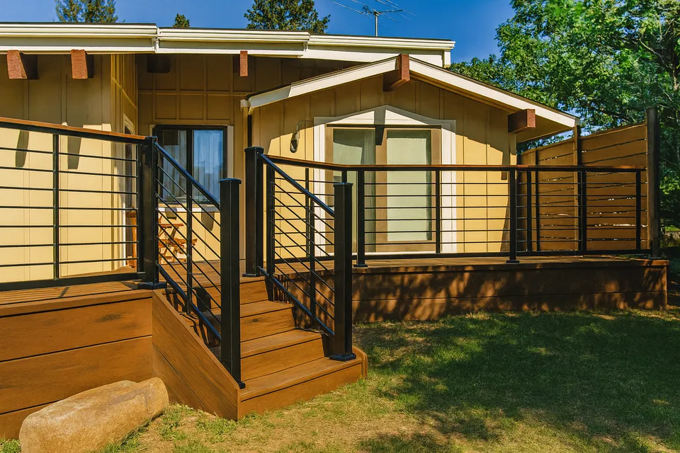Modern cable deck railing on a custom backyard deck in Colorado